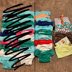 10 bum genius all in one cloth diapers and six wet bags
